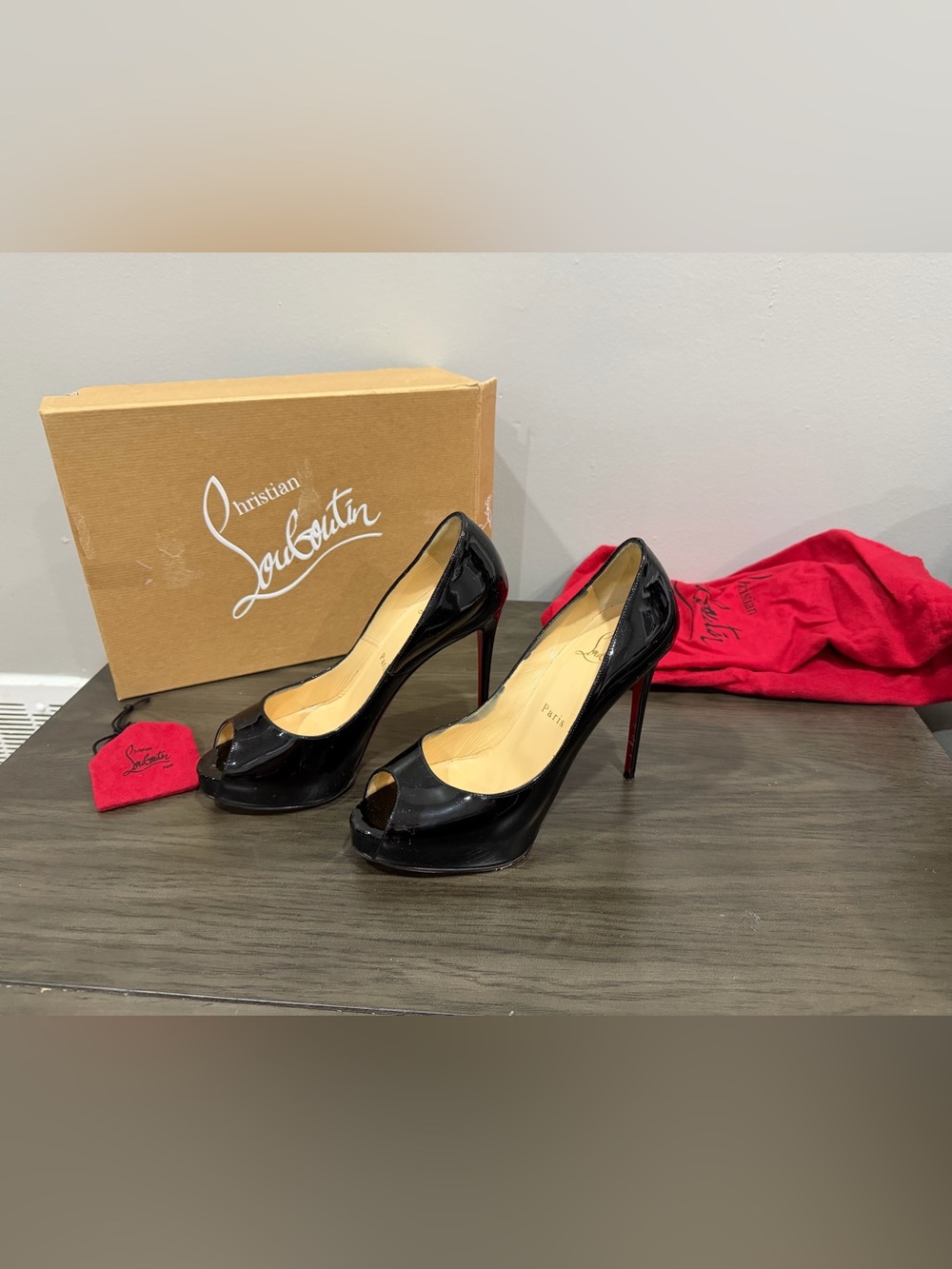 Christian Louboutin Black Patent Leather Peep-Toe Pumps with Red Soles